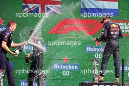 Race winner Max Verstappen (NLD) Red Bull Racing celebrates on the podium with George Russell (GBR) Mercedes AMG F1 and Craig Skinner (GBR) Red Bull Racing Chief Designer. 04.09.2022. Formula 1 World Championship, Rd 14, Dutch Grand Prix, Zandvoort, Netherlands, Race Day.