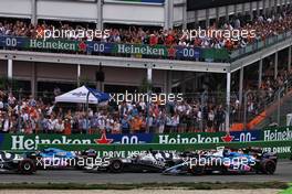 Esteban Ocon (FRA) Alpine F1 Team A522; Pierre Gasly (FRA) AlphaTauri AT03; and Fernando Alonso (ESP) Alpine F1 Team A522, at the start of the race. 04.09.2022. Formula 1 World Championship, Rd 14, Dutch Grand Prix, Zandvoort, Netherlands, Race Day.