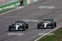 George Russell (GBR) Mercedes AMG F1 W13 and Lewis Hamilton (GBR) Mercedes AMG F1 W13 battle for position. 04.09.2022. Formula 1 World Championship, Rd 14, Dutch Grand Prix, Zandvoort, Netherlands, Race Day.