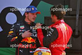 (L to R): pole sitter Max Verstappen (NLD) Red Bull Racing with Charles Leclerc (MON) Ferrari in qualifying parc ferme. 03.09.2022. Formula 1 World Championship, Rd 14, Dutch Grand Prix, Zandvoort, Netherlands, Qualifying Day.