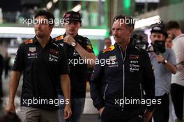 (L to R): Sergio Perez (MEX) Red Bull Racing; Max Verstappen (NLD) Red Bull Racing; and Christian Horner (GBR) Red Bull Racing Team Principal head to a meeting following a missile strike on an Aramco oil facility near to the circuit.  25.03.2022 Formula 1 World Championship, Rd 2, Saudi Arabian Grand Prix, Jeddah, Saudi Arabia, Practice Day.