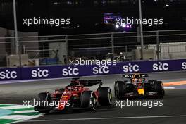 Charles Leclerc (MON) Ferrari F1-75 leads Max Verstappen (NLD) Red Bull Racing RB18. 27.03.2022. Formula 1 World Championship, Rd 2, Saudi Arabian Grand Prix, Jeddah, Saudi Arabia, Race Day.
