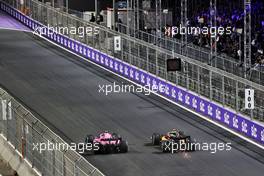 Esteban Ocon (FRA) Alpine F1 Team A522 and Lando Norris (GBR) McLaren MCL36 battle for position. 27.03.2022. Formula 1 World Championship, Rd 2, Saudi Arabian Grand Prix, Jeddah, Saudi Arabia, Race Day.