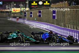 Alexander Albon (THA) Williams Racing FW44 and Nico Hulkenberg (GER) Aston Martin F1 Team Reserve Driver AMR22 battle for position. 27.03.2022. Formula 1 World Championship, Rd 2, Saudi Arabian Grand Prix, Jeddah, Saudi Arabia, Race Day.