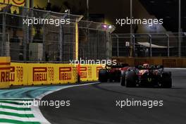 Charles Leclerc (MON) Ferrari F1-75 leads Max Verstappen (NLD) Red Bull Racing RB18. 27.03.2022. Formula 1 World Championship, Rd 2, Saudi Arabian Grand Prix, Jeddah, Saudi Arabia, Race Day.
