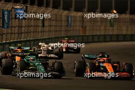 Nico Hulkenberg (GER) Aston Martin F1 Team Reserve Driver AMR22 and Daniel Ricciardo (AUS) McLaren MCL36. 27.03.2022. Formula 1 World Championship, Rd 2, Saudi Arabian Grand Prix, Jeddah, Saudi Arabia, Race Day.
