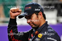 Sergio Perez (MEX) Red Bull Racing celebrates his pole position in qualifying parc ferme. 26.03.2022. Formula 1 World Championship, Rd 2, Saudi Arabian Grand Prix, Jeddah, Saudi Arabia, Qualifying Day.