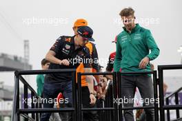 (L to R): Max Verstappen (NLD) Red Bull Racing and Nico Hulkenberg (GER) Aston Martin F1 Team Reserve Driver on the drivers parade. 27.03.2022. Formula 1 World Championship, Rd 2, Saudi Arabian Grand Prix, Jeddah, Saudi Arabia, Race Day.