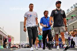 (L to R): Mick Schumacher (GER) Haas F1 Team and Sergio Perez (MEX) Red Bull Racing on the drivers parade. 27.03.2022. Formula 1 World Championship, Rd 2, Saudi Arabian Grand Prix, Jeddah, Saudi Arabia, Race Day.
