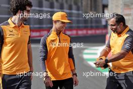 Lando Norris (GBR) McLaren walks the circuit with Jose Manuel Lopez Garcia (ESP) McLaren Lead Performance Engineer (Left) and Randy Singh (GBR) McLaren Strategy and Sporting Director (Right). 24.03.2022. Formula 1 World Championship, Rd 2, Saudi Arabian Grand Prix, Jeddah, Saudi Arabia, Preparation Day.