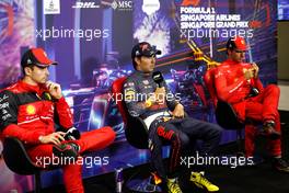 (L to R): Charles Leclerc (MON) Ferrari; Sergio Perez (MEX) Red Bull Racing; and Carlos Sainz Jr (ESP) Ferrari, in the post race FIA Press Conference. 02.10.2022. Formula 1 World Championship, Rd 17, Singapore Grand Prix, Marina Bay Street Circuit, Singapore, Race Day.