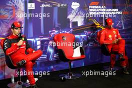 (L to R): Charles Leclerc (MON) Ferrari and Carlos Sainz Jr (ESP) Ferrari in the post race FIA Press Conference. 02.10.2022. Formula 1 World Championship, Rd 17, Singapore Grand Prix, Marina Bay Street Circuit, Singapore, Race Day.