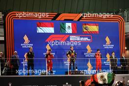 The podium (L to R): Hugh Bird (GBR) Red Bull Racing Engineer; Charles Leclerc (MON) Ferrari, second; Sergio Perez (MEX) Red Bull Racing, race winner; Carlos Sainz Jr (ESP) Ferrari, third. 02.10.2022. Formula 1 World Championship, Rd 17, Singapore Grand Prix, Marina Bay Street Circuit, Singapore, Race Day.