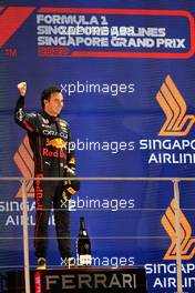 Race winner Sergio Perez (MEX) Red Bull Racing celebrates on the podium. 02.10.2022. Formula 1 World Championship, Rd 17, Singapore Grand Prix, Marina Bay Street Circuit, Singapore, Race Day.