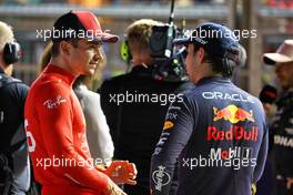 (L to R): Charles Leclerc (MON) Ferrari in qualifying parc ferme with Sergio Perez (MEX) Red Bull Racing. 01.10.2022. Formula 1 World Championship, Rd 17, Singapore Grand Prix, Marina Bay Street Circuit, Singapore, Qualifying Day.