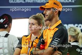 (L to R): Sophie Ogg (GBR) McLaren Communications Director and Daniel Ricciardo (AUS) McLaren. 01.10.2022. Formula 1 World Championship, Rd 17, Singapore Grand Prix, Marina Bay Street Circuit, Singapore, Qualifying Day.