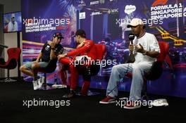 (L to R): Sergio Perez (MEX) Red Bull Racing; Charles Leclerc (MON) Ferrari; and Lewis Hamilton (GBR) Mercedes AMG F1, in the post qualifying FIA Press Conference. 01.10.2022. Formula 1 World Championship, Rd 17, Singapore Grand Prix, Marina Bay Street Circuit, Singapore, Qualifying Day.