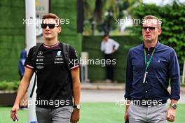 (L to R): George Russell (GBR) Mercedes AMG F1 with Harry Soden (GBR) Driver Manager. 01.10.2022. Formula 1 World Championship, Rd 17, Singapore Grand Prix, Marina Bay Street Circuit, Singapore, Qualifying Day.