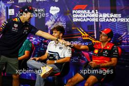 Sergio Perez (MEX) Red Bull Racing and Carlos Sainz Jr (ESP) Ferrari in the FIA Press Conference. 29.09.2022. Formula 1 World Championship, Rd 17, Singapore Grand Prix, Marina Bay Street Circuit, Singapore, Preparation Day.