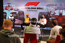 (L to R): Pierre Gasly (FRA) AlphaTauri; Lando Norris (GBR) McLaren; and George Russell (GBR) Mercedes AMG F1 in the FIA Press Conference. 25.02.2022. Formula One Testing, Day Three, Barcelona, Spain. Friday.