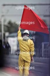 Marshal with red flag. 25.02.2022. Formula One Testing, Day Three, Barcelona, Spain. Friday.
