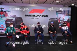 (L to R): Sebastian Vettel (GER) Aston Martin F1 Team; Charles Leclerc (MON) Ferrari; Max Verstappen (NLD) Red Bull Racing; Fernando Alonso (ESP) Alpine F1 Team; and Yuki Tsunoda (JPN) AlphaTauri, in the FIA Press Conference. 24.02.2022. Formula One Testing, Day Two, Barcelona, Spain. Thursday.