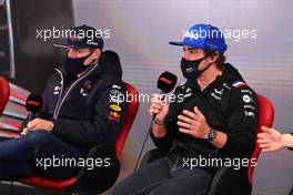 Fernando Alonso (ESP) Alpine F1 Team and Max Verstappen (NLD) Red Bull Racing in the FIA Press Conference. 24.02.2022. Formula One Testing, Day Two, Barcelona, Spain. Thursday.