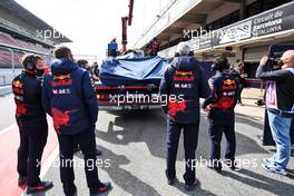 The Red Bull Racing RB18 of Sergio Perez (MEX) Red Bull Racing is recovered back to the pits on the back of a truck. 24.02.2022. Formula One Testing, Day Two, Barcelona, Spain. Thursday.