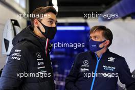 (L to R): George Russell (GBR) Mercedes AMG F1 with Jost Capito (GER) Williams Racing Chief Executive Officer. 23.02.2022. Formula One Testing, Day One, Barcelona, Spain. Wednesday.
