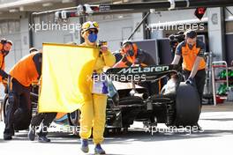 Lando Norris (GBR) McLaren MCL36 pushed back in the pits. 23.02.2022. Formula One Testing, Day One, Barcelona, Spain. Wednesday.