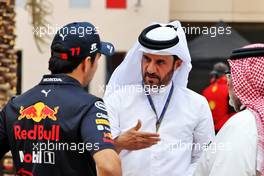 Sergio Perez (MEX) Red Bull Racing with Mohammed Bin Sulayem (UAE) FIA President. 11.03.2022. Formula 1 Testing, Sakhir, Bahrain, Day Two.