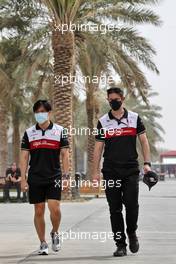 Guanyu Zhou (CHN) Alfa Romeo F1 Team (Left). 11.03.2022. Formula 1 Testing, Sakhir, Bahrain, Day Two.