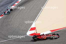 Charles Leclerc (MON) Ferrari F1-75 and George Russell (GBR) Mercedes AMG F1 W13. 11.03.2022. Formula 1 Testing, Sakhir, Bahrain, Day Two.