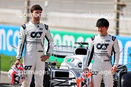 (L to R): Pierre Gasly (FRA) AlphaTauri and Yuki Tsunoda (JPN) AlphaTauri. 10.03.2022. Formula 1 Testing, Sakhir, Bahrain, Day One.
