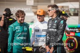 (L to R): Sebastian Vettel (GER) Aston Martin F1 Team with Lando Norris (GBR) McLaren and George Russell (GBR) Mercedes AMG F1. 10.03.2022. Formula 1 Testing, Sakhir, Bahrain, Day One.