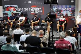 (L to R): Nicholas Latifi (CDN) Williams Racing; Yuki Tsunoda (JPN) AlphaTauri; Max Verstappen (NLD) Red Bull Racing; George Russell (GBR) Mercedes AMG F1; and Guanyu Zhou (CHN) Alfa Romeo F1 Team, in the FIA Press Conference. 10.03.2022. Formula 1 Testing, Sakhir, Bahrain, Day One.