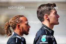 George Russell (GBR) Mercedes AMG F1 and Lewis Hamilton (GBR) Mercedes AMG F1. 10.03.2022. Formula 1 Testing, Sakhir, Bahrain, Day One.