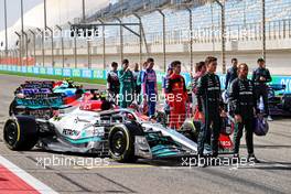 George Russell (GBR) Mercedes AMG F1 W13 and Lewis Hamilton (GBR) Mercedes AMG F1. 10.03.2022. Formula 1 Testing, Sakhir, Bahrain, Day One.