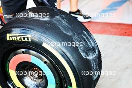 A flat spotted Pirelli tyre from a McLaren MCL36. 18.11.2022. Formula 1 World Championship, Rd 22, Abu Dhabi Grand Prix, Yas Marina Circuit, Abu Dhabi, Practice Day.