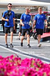 (L to R): Kevin Magnussen (DEN) Haas F1 Team with team mate Mick Schumacher (GER) Haas F1 Team. 18.11.2022. Formula 1 World Championship, Rd 22, Abu Dhabi Grand Prix, Yas Marina Circuit, Abu Dhabi, Practice Day.