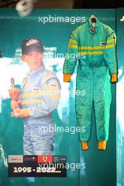 A picture of a young Sebastian Vettel (GER) Aston Martin F1 Team and his karting overalls in the team garage. 18.11.2022. Formula 1 World Championship, Rd 22, Abu Dhabi Grand Prix, Yas Marina Circuit, Abu Dhabi, Practice Day.