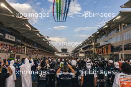 AlphaTauri on the grid as flyby takes place. 20.11.2022. Formula 1 World Championship, Rd 22, Abu Dhabi Grand Prix, Yas Marina Circuit, Abu Dhabi, Race Day.