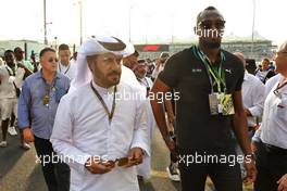 (L to R): Mohammed Bin Sulayem (UAE) FIA President with Usain Bolt (JAM) Former Athlete on the grid. 20.11.2022. Formula 1 World Championship, Rd 22, Abu Dhabi Grand Prix, Yas Marina Circuit, Abu Dhabi, Race Day.
