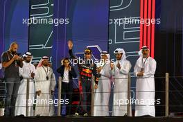 Race winner Max Verstappen (NLD) Red Bull Racing celebrates on the podium. 20.11.2022. Formula 1 World Championship, Rd 22, Abu Dhabi Grand Prix, Yas Marina Circuit, Abu Dhabi, Race Day.