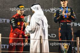 Charles Leclerc (MON) Ferrari celebrates his second position on the podium. 20.11.2022. Formula 1 World Championship, Rd 22, Abu Dhabi Grand Prix, Yas Marina Circuit, Abu Dhabi, Race Day.