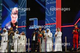 Sergio Perez (MEX) Red Bull Racing celebrates his third position on the podium. 20.11.2022. Formula 1 World Championship, Rd 22, Abu Dhabi Grand Prix, Yas Marina Circuit, Abu Dhabi, Race Day.
