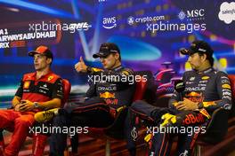 (L to R): Charles Leclerc (MON) Ferrari; Max Verstappen (NLD) Red Bull Racing; and Sergio Perez (MEX) Red Bull Racing, in the post race FIA Press Conference. 20.11.2022. Formula 1 World Championship, Rd 22, Abu Dhabi Grand Prix, Yas Marina Circuit, Abu Dhabi, Race Day.