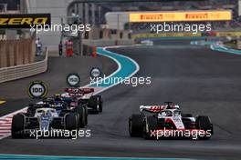 Pierre Gasly (FRA) AlphaTauri AT03 and Kevin Magnussen (DEN) Haas VF-22 battle for position. 20.11.2022. Formula 1 World Championship, Rd 22, Abu Dhabi Grand Prix, Yas Marina Circuit, Abu Dhabi, Race Day.