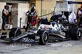 Yuki Tsunoda (JPN) AlphaTauri AT03 makes a pit stop. 20.11.2022. Formula 1 World Championship, Rd 22, Abu Dhabi Grand Prix, Yas Marina Circuit, Abu Dhabi, Race Day.