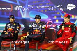 (L to R): Sergio Perez (MEX) Red Bull Racing; Max Verstappen (NLD) Red Bull Racing; and Charles Leclerc (MON) Ferrari, in the post qualifying FIA Press Conference. 19.11.2022. Formula 1 World Championship, Rd 22, Abu Dhabi Grand Prix, Yas Marina Circuit, Abu Dhabi, Qualifying Day.
